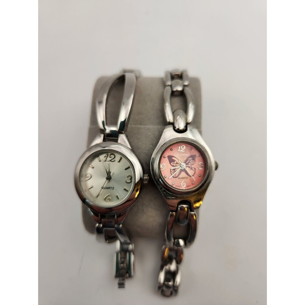 Two Women's Stainless Watches.  Butterfly Dial.  K22